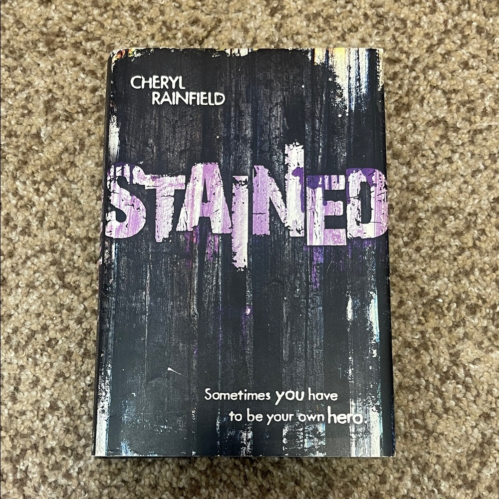 Stained by Cheryl Rainfield Hardcover Book